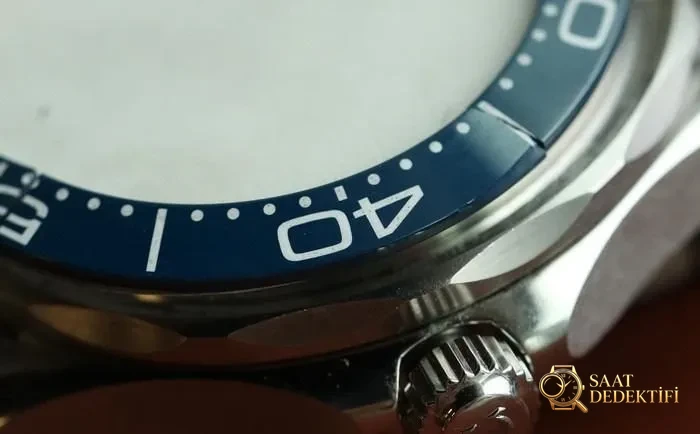 Ayrıntılı inceleme: VS Factory Omega Seamaster 300 replika 8800 mekanizması, çift T darbe emici ve orijinalden farkları - Mekanizma Zemberek ve Balans Detayı