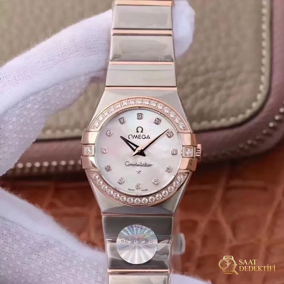 En Güncel 3S (SSS) Fabrikası Omega Constellation Orijinal Mekanizma 27 MM Kuvars Kadın Replika Saat Gerçek-Replika Karşılaştırması ve Orijinal İnceleme - Mekanizma Zemberek ve Balans Detayı