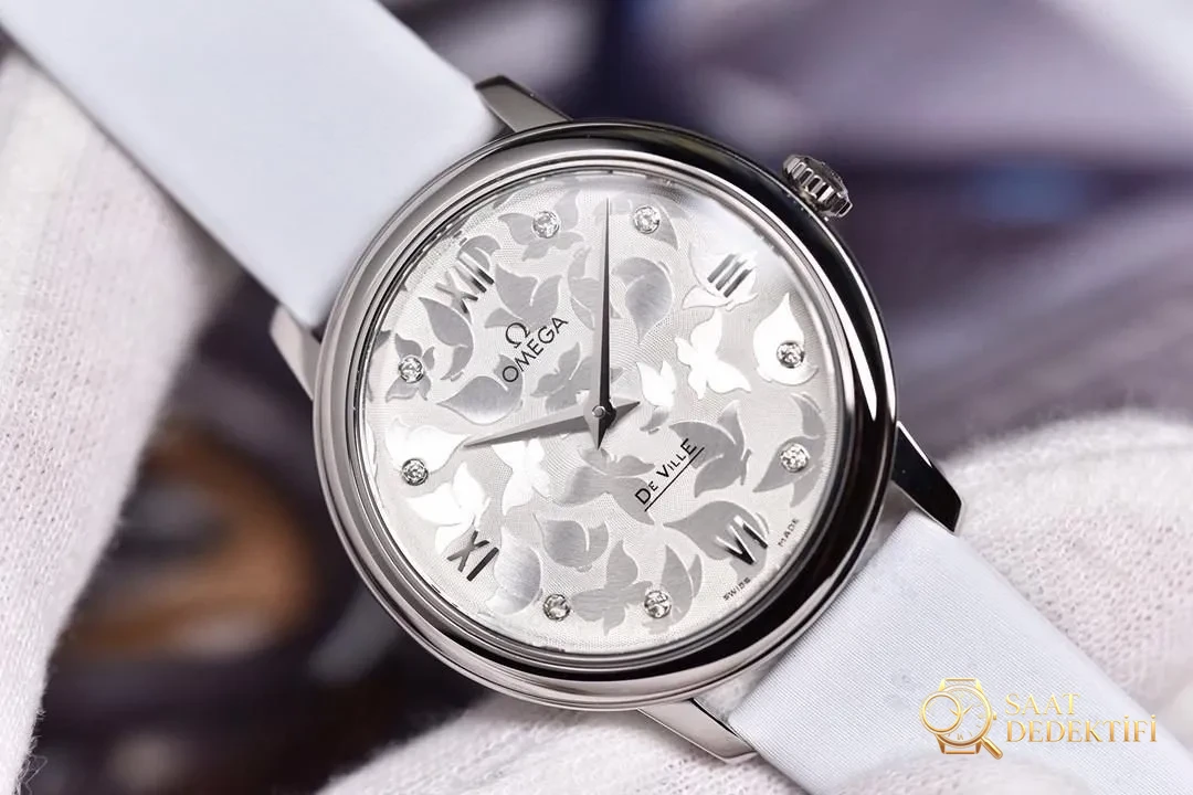 Gerçek-Replika Karşılaştırması: 3S Factory Omega De Ville Prestige Butterfly Kadın Kol Saati - Kasa Profili ve Kurma Kolu İncelemesi