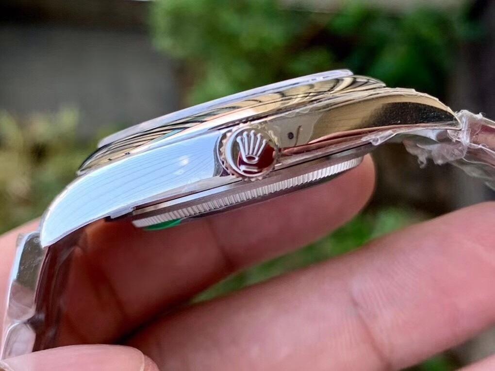 Gerçek-replika karşılaştırması: EW Factory Rolex Oyster Perpetual 41 mm replika saat ilk bakışta sahte — 10. fotoğraf