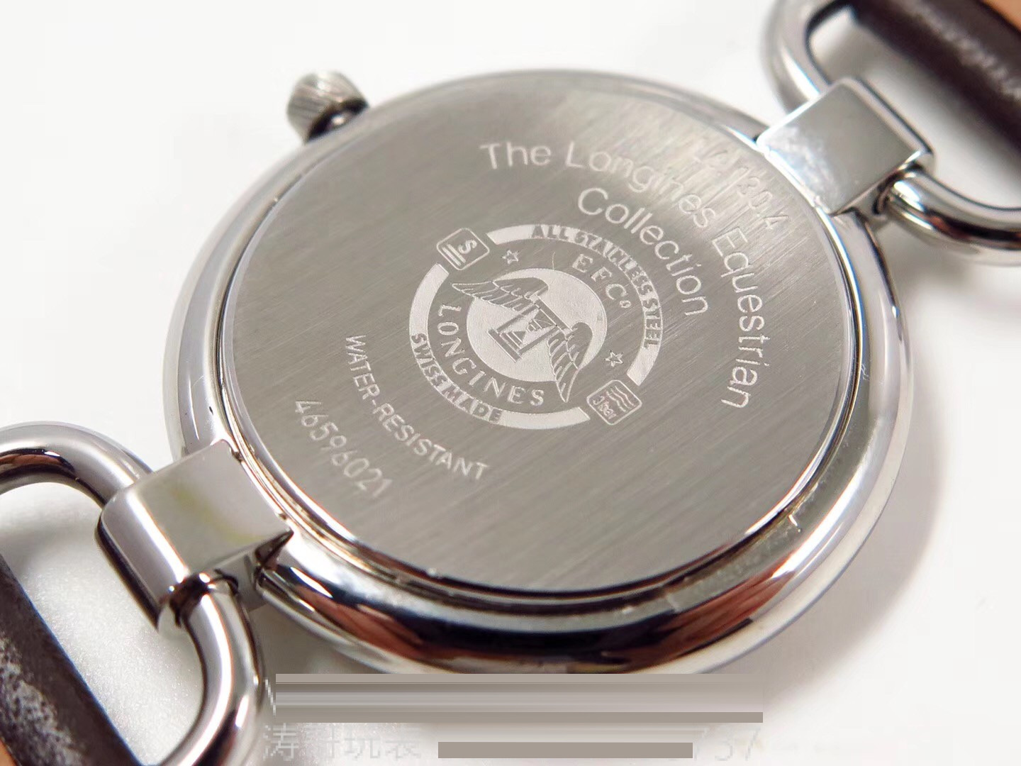 Gerçek-replika karşılaştırması: GS Factory Longines Equestrian serisi kadın replika saati 26,5 mm orijinal İsviçre 152 kuvars mekanizmasıyla orijinaline kıyasla nasıl? İlk bakışta sahte olduğu belli olur mu? — 30. fotoğraf