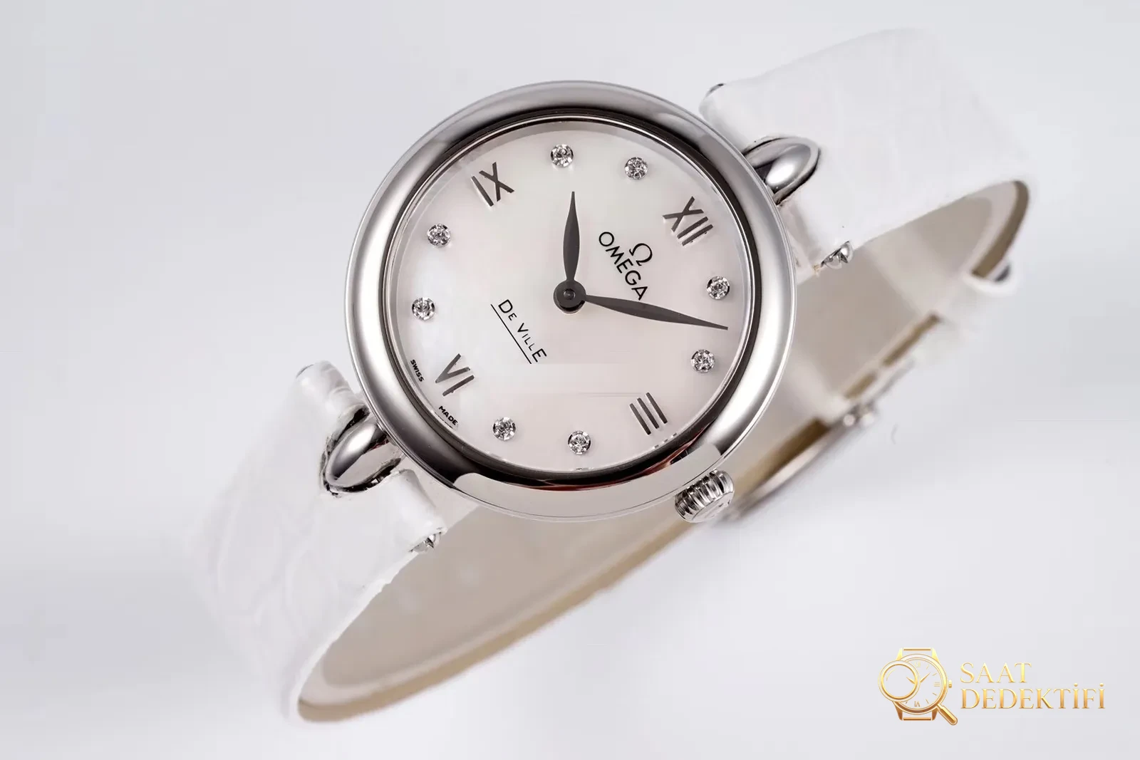 Gerçek-replika karşılaştırması: GS Factory Omega De Ville serisi 424.13.27.60.55.001 replika kadın kol saati 27.4 mm İsviçre menşeli kuvars - Tepe Koruması ve Ayar Fonksiyonu
