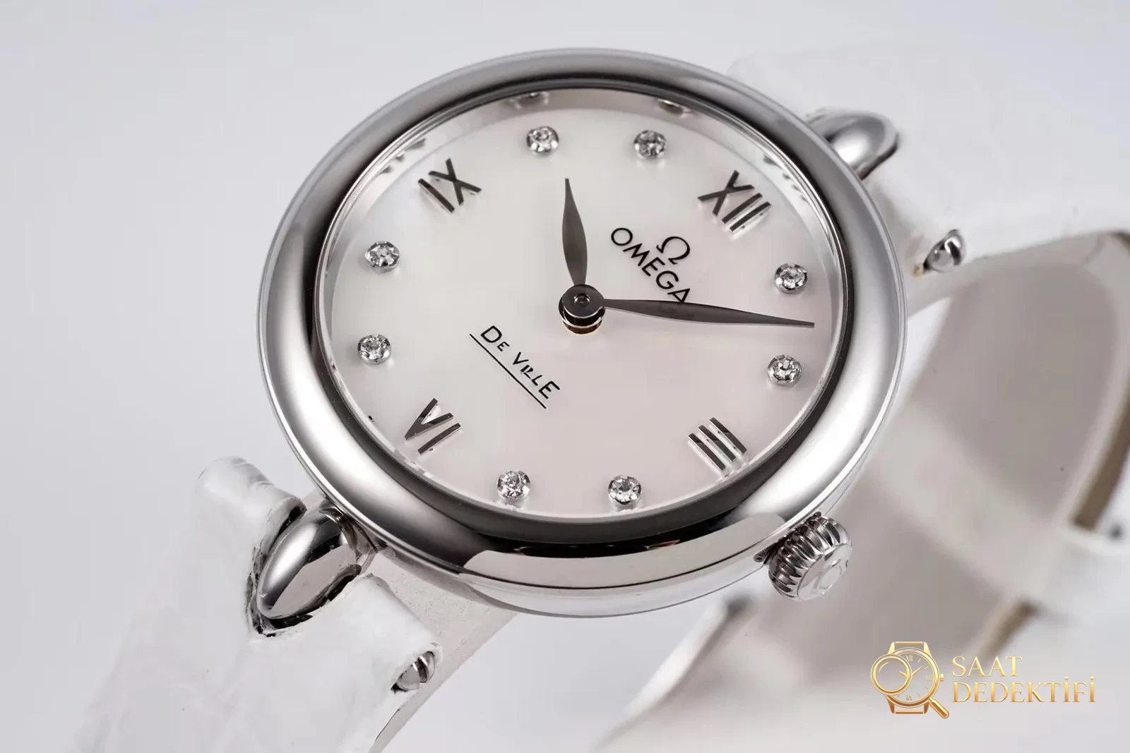 Gerçek-replika karşılaştırması: GS Factory Omega De Ville serisi 424.13.27.60.55.001 replika kadın kol saati 27.4 mm İsviçre menşeli kuvars - Bilezik Bakla Ayrımı ve Pim Yapısı