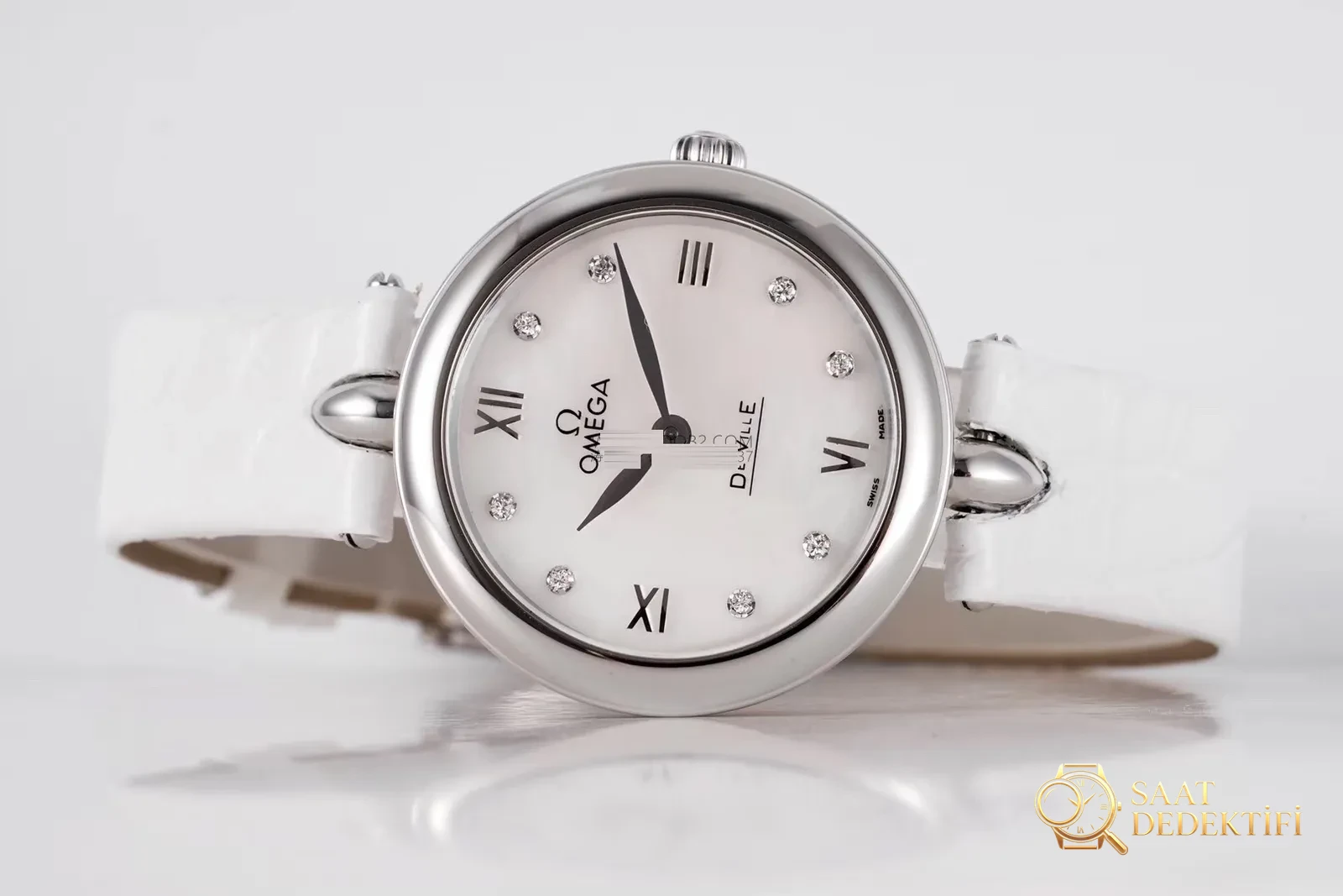 Gerçek-replika karşılaştırması: GS Factory Omega De Ville serisi 424.13.27.60.55.001 replika kadın kol saati 27.4 mm İsviçre menşeli kuvars - Kadran İbreleri ve Saniye Akışı