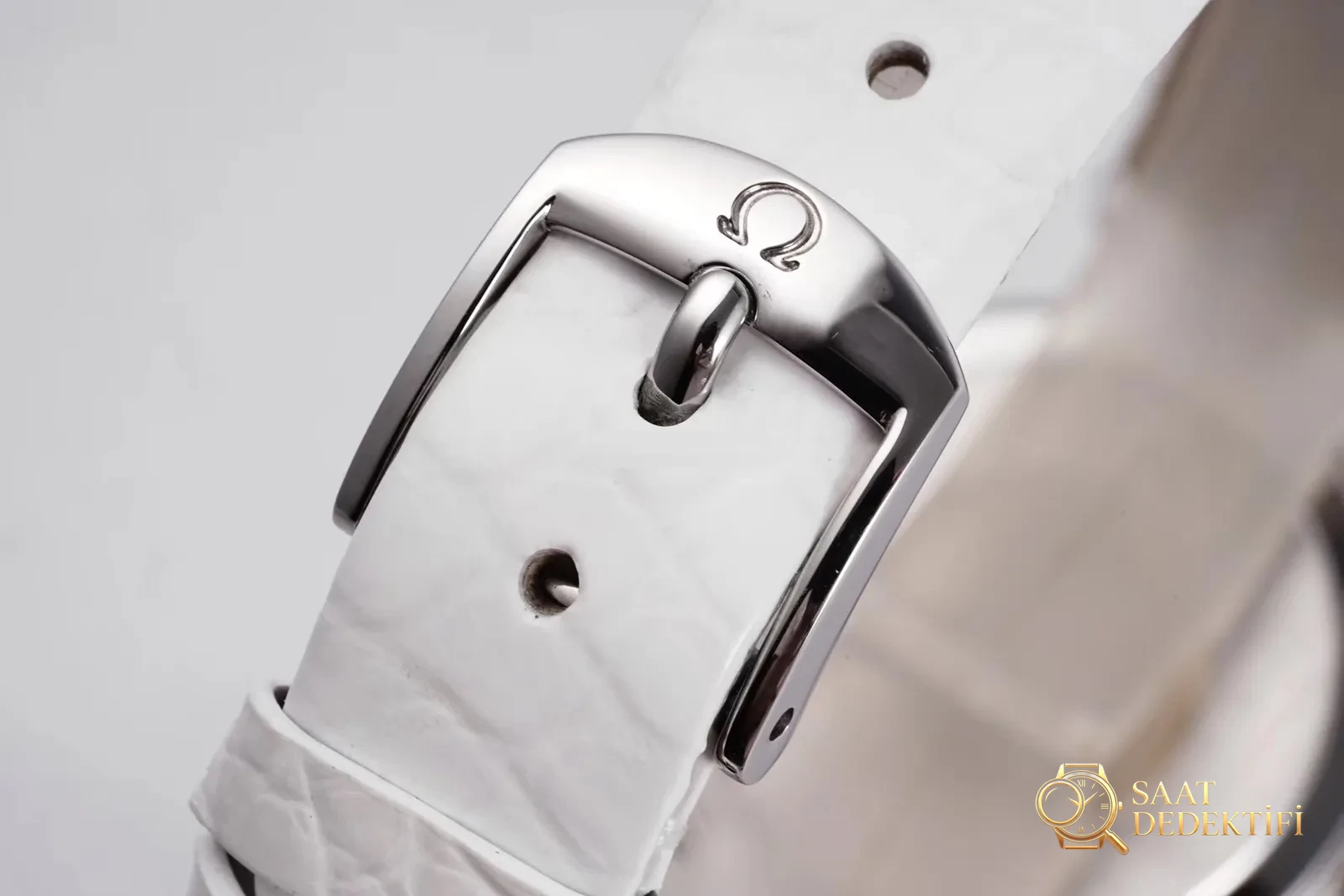 Gerçek-replika karşılaştırması: GS Factory Omega De Ville serisi 424.13.27.60.55.001 replika kadın kol saati 27.4 mm İsviçre menşeli kuvars - Koleksiyon ve Vitrin Görünümü