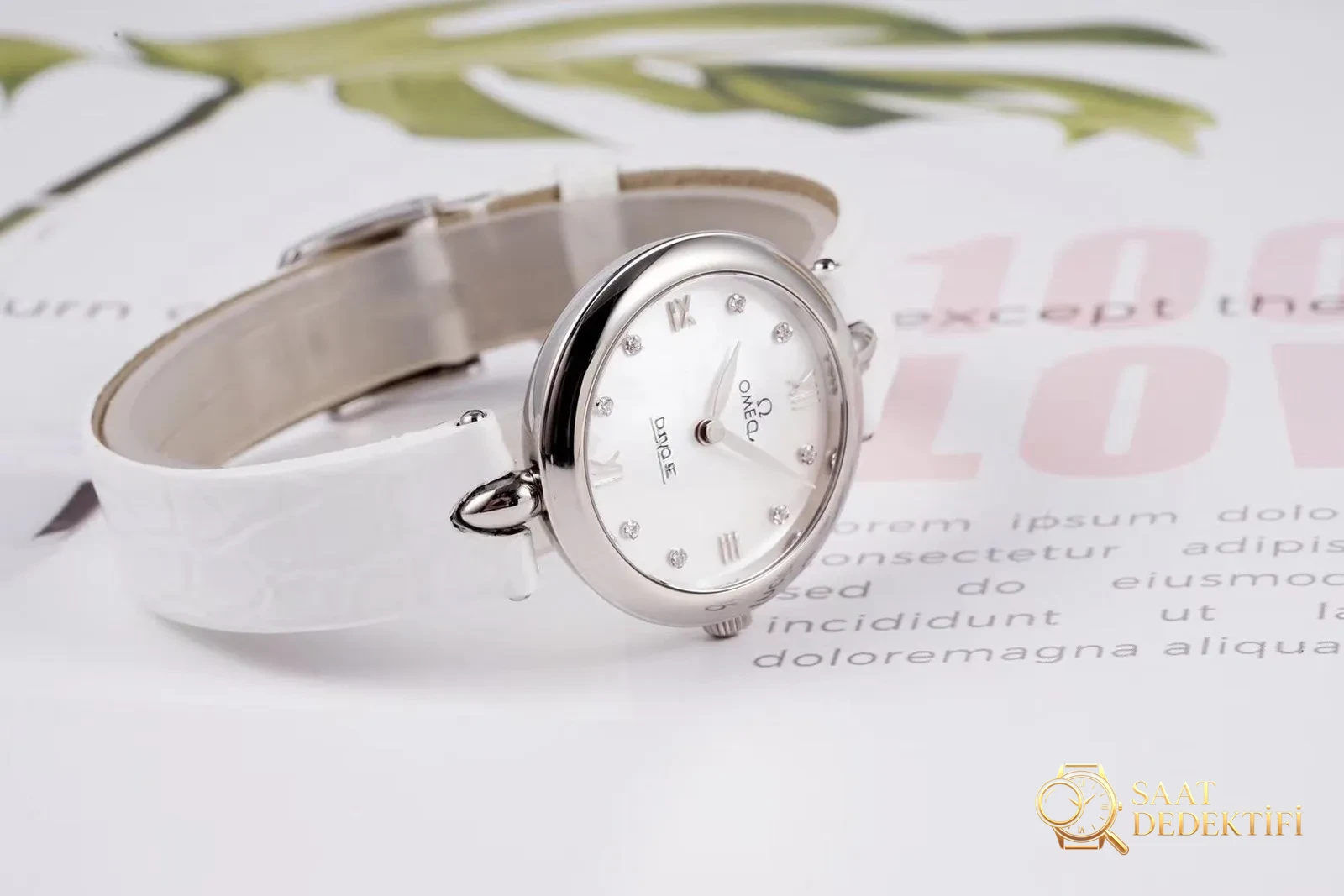 Gerçek-replika karşılaştırması: GS Factory Omega De Ville serisi 424.13.27.60.55.001 replika kadın kol saati 27.4 mm İsviçre menşeli kuvars - Arka Kapak Gravür ve Seri Numarası