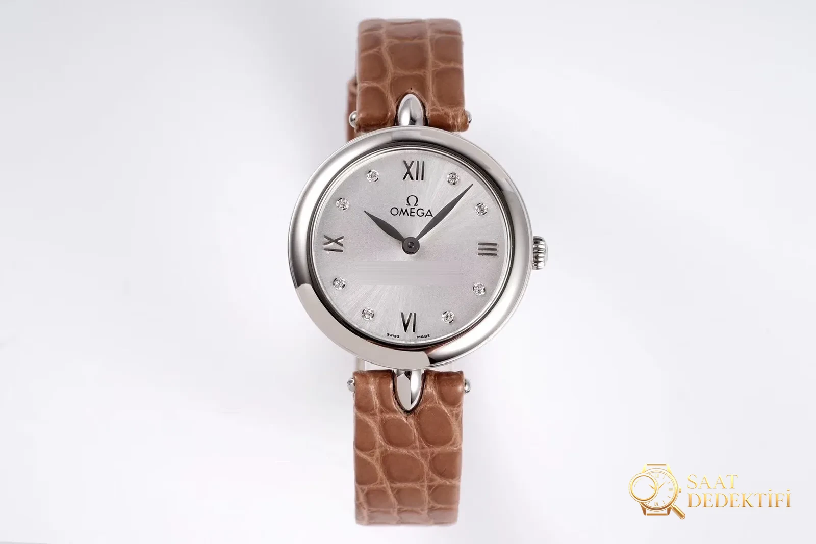 Gerçek-replika karşılaştırması: GS Factory Omega De Ville serisi 424.13.27.60.55.001 replika kadın kol saati 27.4 mm İsviçre menşeli kuvars - Bezel İçi Rehaut Gravürü ve Hizalaması