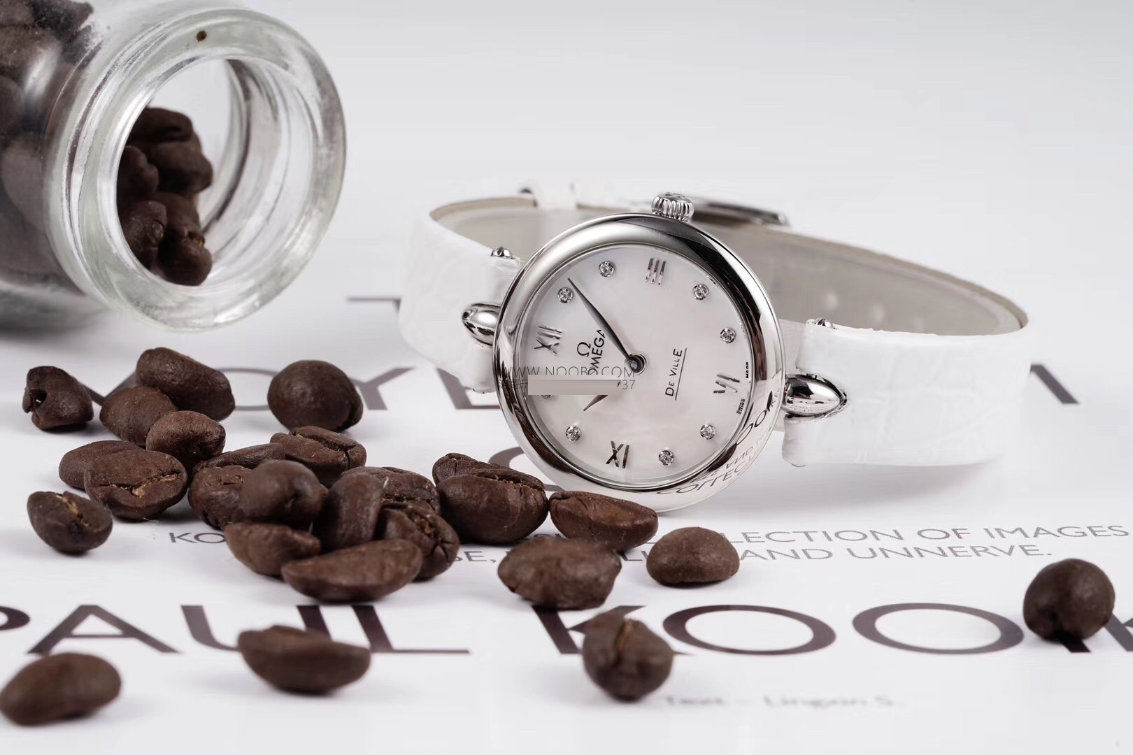 Gerçek-replika karşılaştırması: GS Factory Omega De Ville serisi 424.13.27.60.55.001 replika kadın kol saati 27.4 mm İsviçre menşeli kuvars — 25. fotoğraf