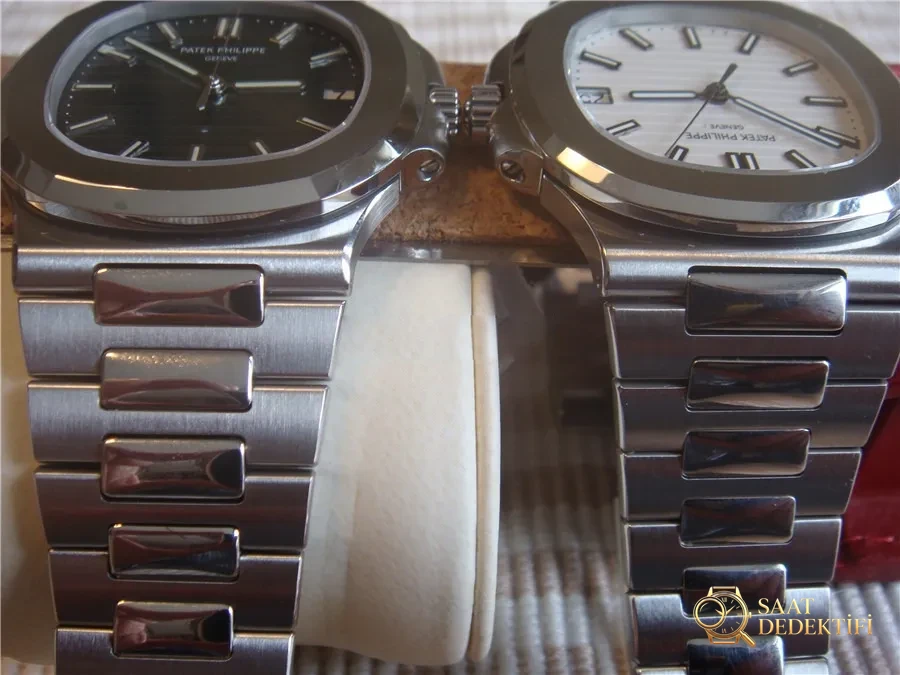Gerçek-replika karşılaştırması: PPF Factory beyaz kadranlı Nautilus V2 versiyon replika saatin orijinal Patek Philippe 5711 mavi kadranlı ile karşılaştırma incelemesi - Fosfor ve Super-LumiNova Gece Görünümü