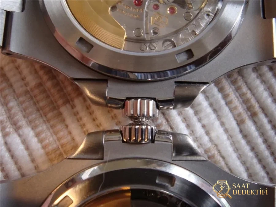 Gerçek-replika karşılaştırması: PPF Factory beyaz kadranlı Nautilus V2 versiyon replika saatin orijinal Patek Philippe 5711 mavi kadranlı ile karşılaştırma incelemesi - Makro Mekanizma Köprüleri ve Cenevre Çizgileri