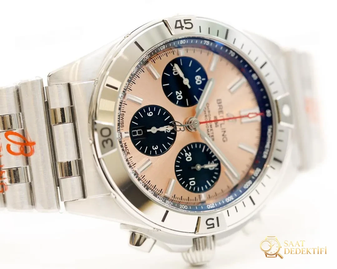 GF Factory replika Breitling Chronomat retro mermi kordonlu 42 mm kronograf, somon bakır kadran - Kasa Profili ve Kurma Kolu İncelemesi