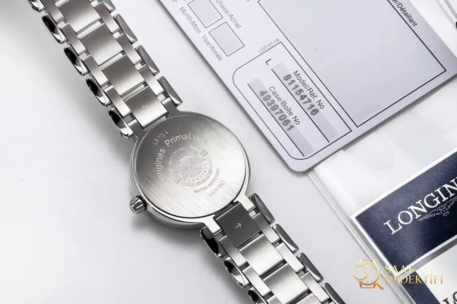 GS Longines PrimaLuna ay evreli orijinal İsviçre kuvars mekanizmalı kadın kol saati nasıl? - Arka Kapak Gravür ve Seri Numarası