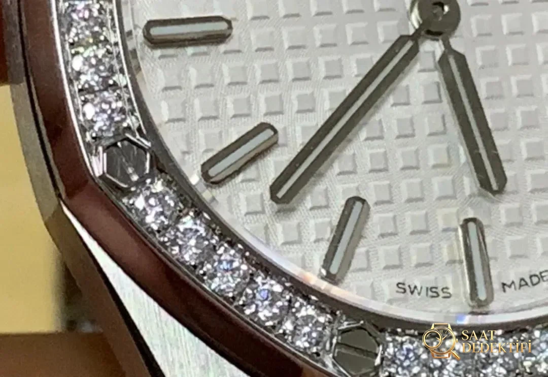 JF Audemars Piguet Royal Oak 67651 kadın saati moissanite taşla modifiye edildi; taşın gerçek olup olmadığı nasıl anlaşılır? - Klips Kilidi ve Lazer Damgalar