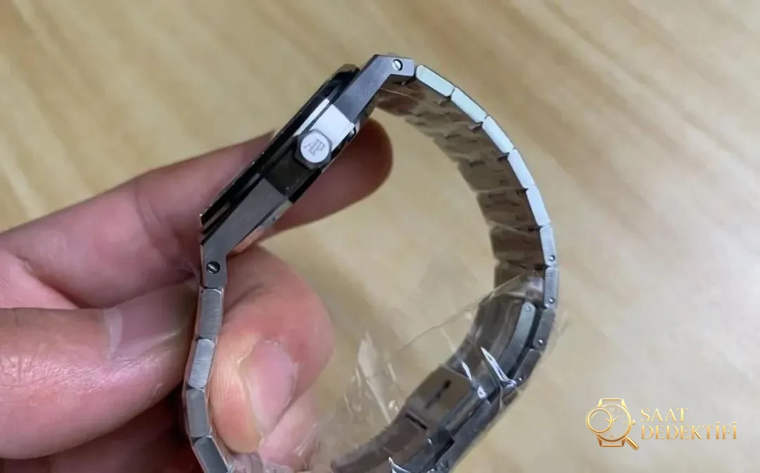 JF Audemars Piguet Royal Oak 67651 kadın saati moissanite taşla modifiye edildi; taşın gerçek olup olmadığı nasıl anlaşılır? - Kasa Çeliği ve Polisaj Kalitesi
