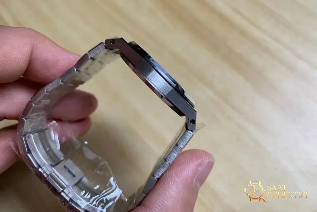 JF Audemars Piguet Royal Oak 67651 kadın saati moissanite taşla modifiye edildi; taşın gerçek olup olmadığı nasıl anlaşılır? - Tepe Koruması ve Ayar Fonksiyonu
