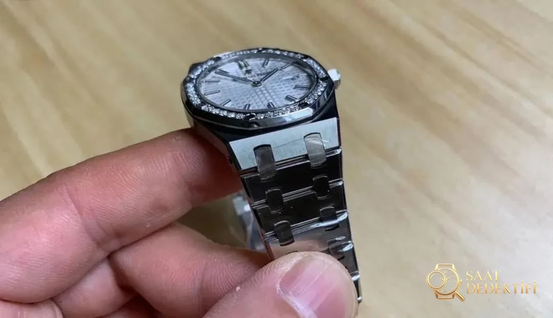 JF Audemars Piguet Royal Oak 67651 kadın saati moissanite taşla modifiye edildi; taşın gerçek olup olmadığı nasıl anlaşılır? - Bilezik Bakla Ayrımı ve Pim Yapısı