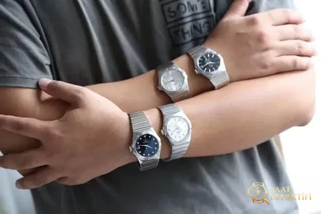 Karşılaştırmalı inceleme: VS Factory Omega Constellation Serisi 123.10.38.21.02.001 çelik bilezikli klasik kol saati - Mekanizma Zemberek ve Balans Detayı