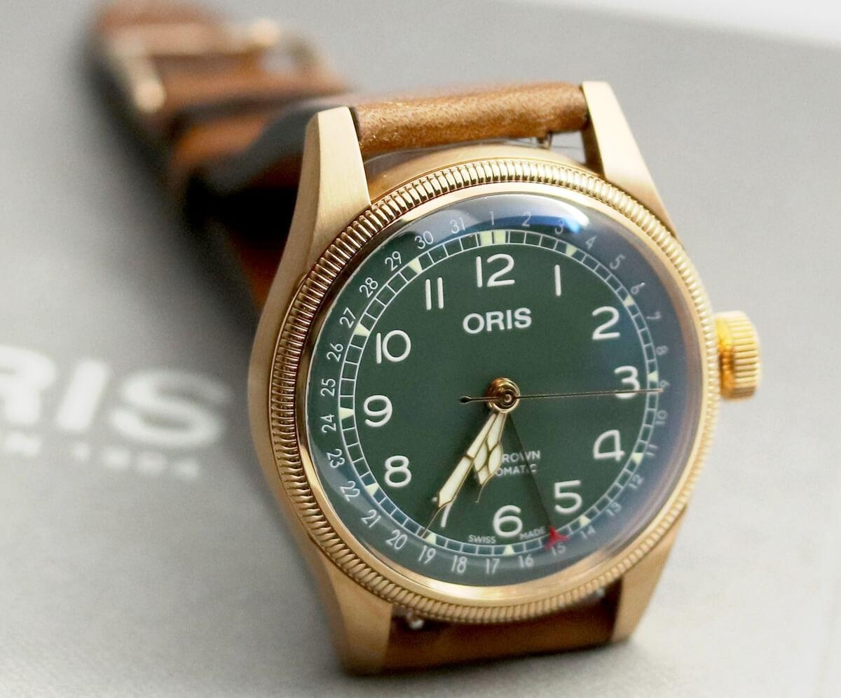01 754 7741 3167 07 5 20 58BR Oris Big Kurma Kolu Pointer Date 80th Yıl Dönümü Edition Bronz İncelemesi