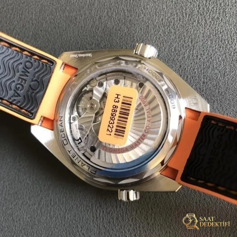 Planet Ocean 600M: VS Factory Omega Seamaster 600M çeyrek turuncu ve orijinal karşılaştırmalı inceleme - Mekanizma Zemberek ve Balans Detayı