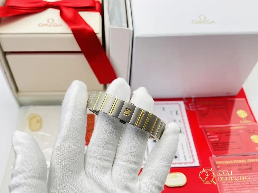 QTQ Factory Omega Xiaohongshu popüler modeli, dördüncü nesil Constellation ölümsüz klasik model - Kasa Profili ve Kurma Kolu İncelemesi