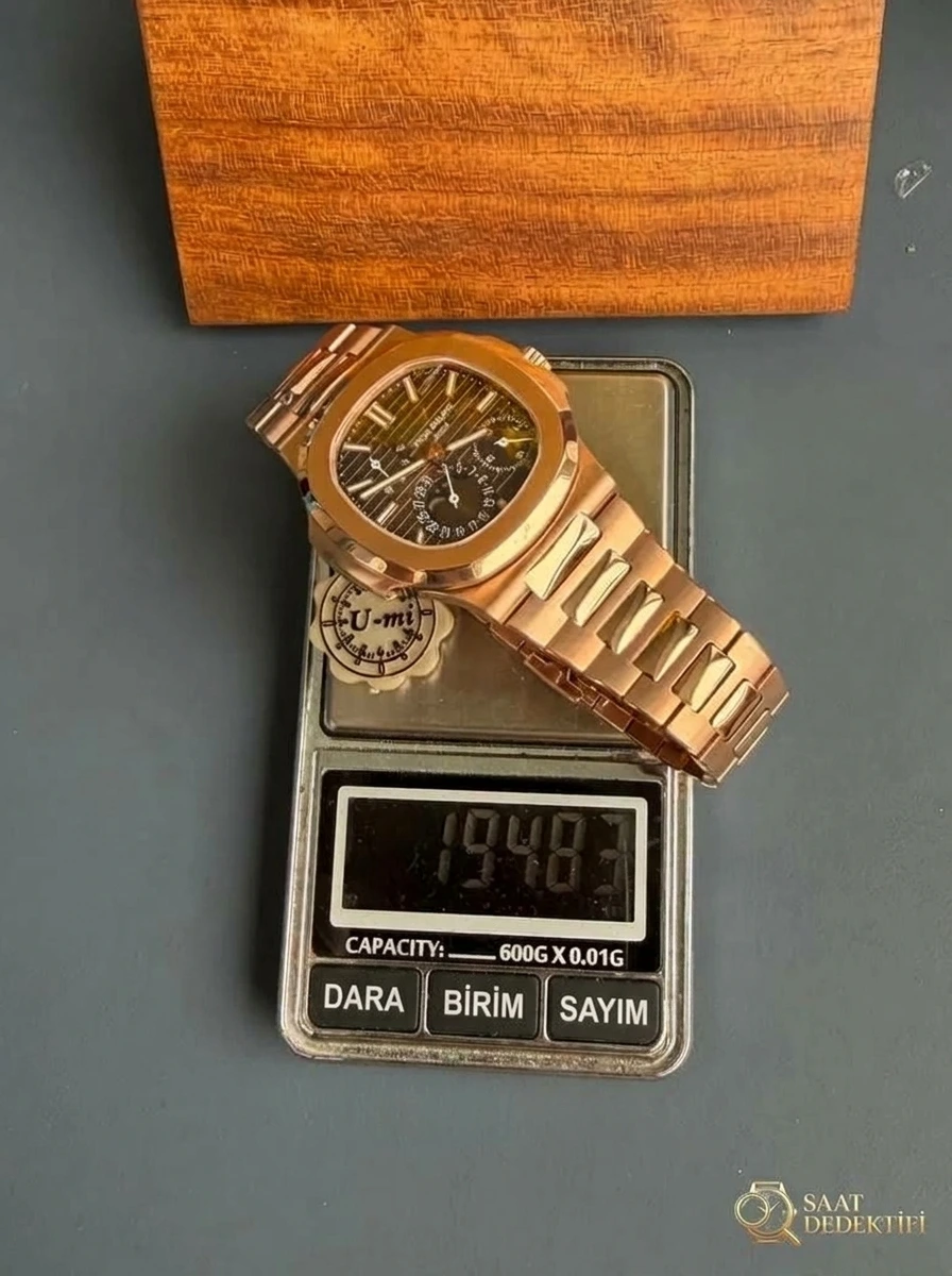 UMI Factory Patek Philippe Nautilus 5712 rose altın, 195 gram ağırlıklı versiyonun kalitesi nasıl? - Kadran Detayı ve Bezel İşçiliği