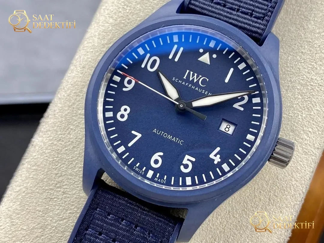 V7 Factory IWC Mark XVIII IW328101 puslu mavi seramikte renk farkı belirgin mi? - Kasa Profili ve Kurma Kolu İncelemesi
