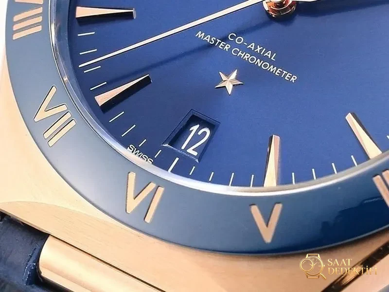 VS Factory Omega 5. Nesil Constellation Rose Gold Mavi Bezel Mavi Kadran Replika Kol Saati - VS Saat - Arka Kapak ve Mekanizma Detayı