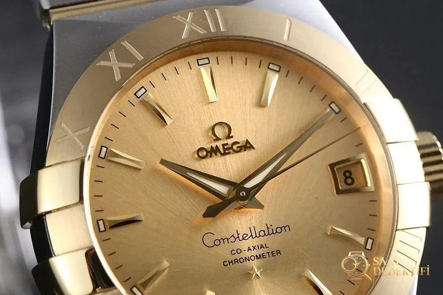 VS Factory Omega Constellation 123.20.38.21.08.001 Replika Saat - 38 mm - Kasa Profili ve Kurma Kolu İncelemesi