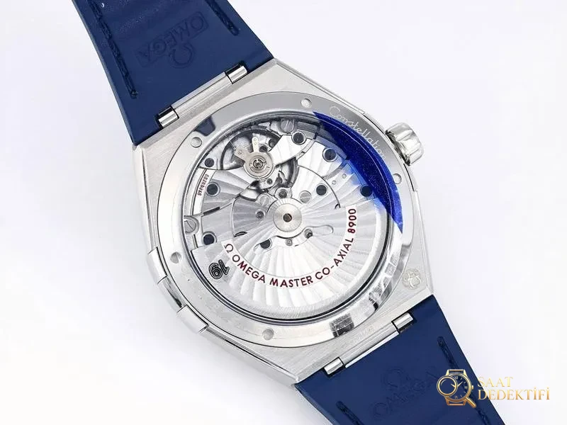 VS Factory Omega Constellation 5. Nesil Mavi Bezel Beyaz Kadran Replika Kol Saati - VS Saat - Fosfor ve Super-LumiNova Gece Görünümü