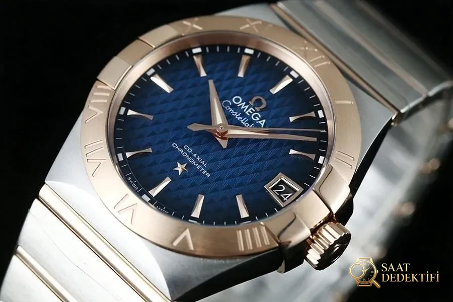 VS Factory Omega Constellation çift renk rose gold smoky blue kabartma eşkenar dörtgen desenli replika saat - 123.20.38.21.03.001 - Kadran Detayı ve Bezel İşçiliği