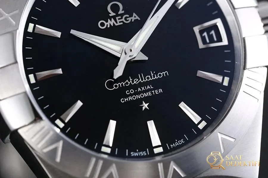 VS Factory Omega Constellation Serisi 123.10.38.21.01.001 Replika Kol Saati - 38 mm Model - Arka Kapak ve Mekanizma Detayı