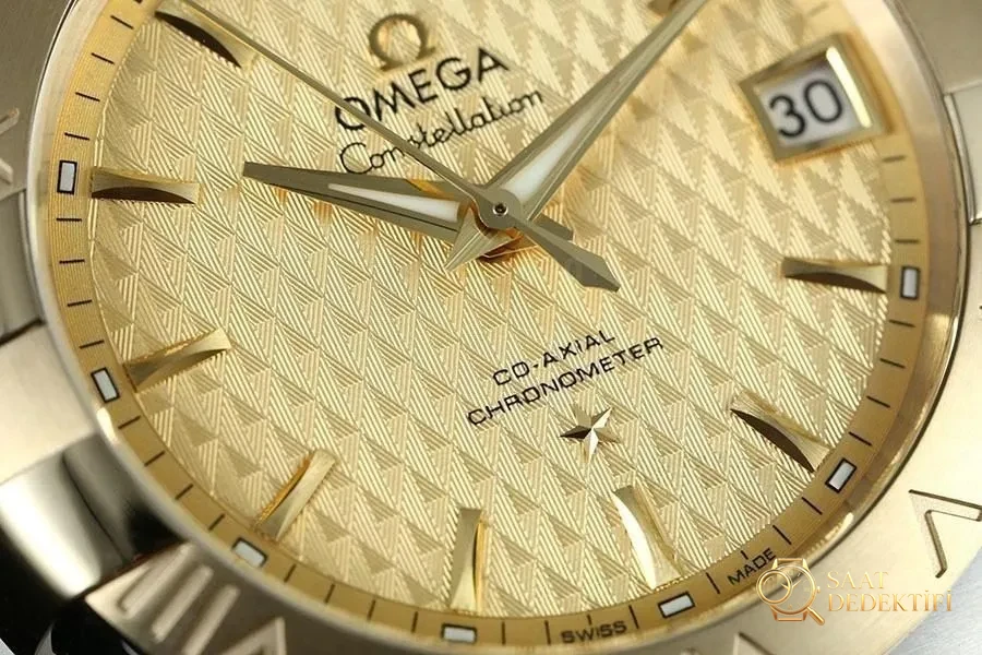 VS Factory Omega Constellation Serisi Baklava Desenli Şampanya Renkli Replika Saat - 123.20.38.21.08.002 - Makro Kadran ve İndeks İşçiliği