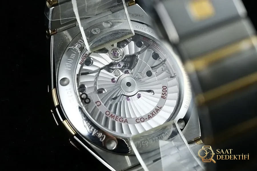 VS Factory Omega Constellation Serisi Baklava Desenli Şampanya Renkli Replika Saat - 123.20.38.21.08.002 - Fosfor ve Super-LumiNova Gece Görünümü