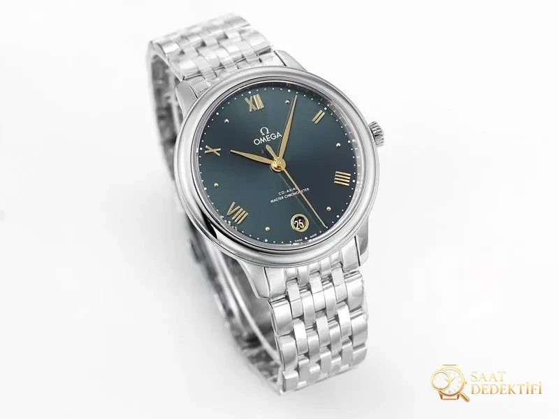 VS Factory Omega De Ville kadın modeli, yeşil kadran, altın akrep ve yelkovan, altın saat işaretli replika kol saati - VS Saat - Kasa Profili ve Kurma Kolu İncelemesi