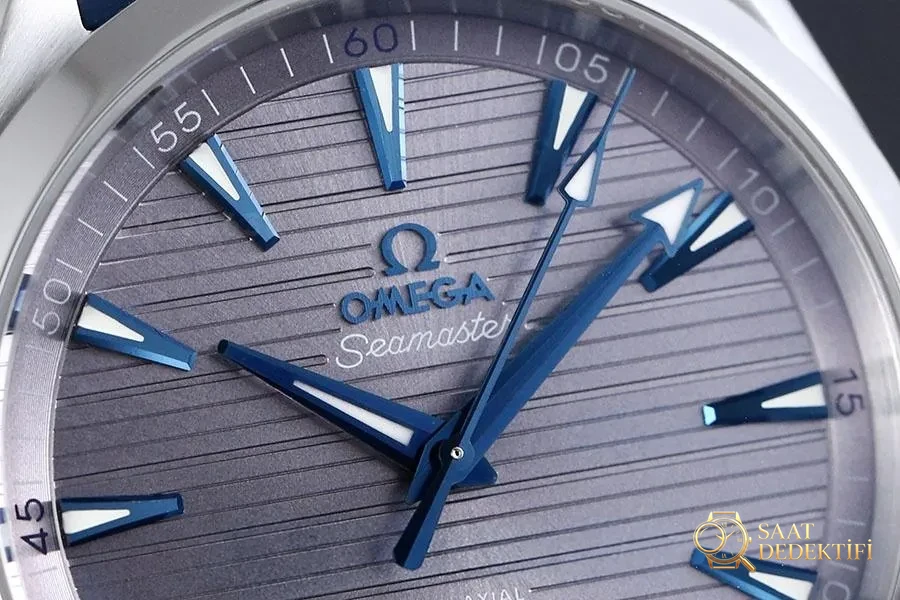 VS Factory Omega Seamaster 150M tik ağacı gri kadran mavi akrep-yelkovan replika kol saati-VS Saat - Kasa Profili ve Kurma Kolu İncelemesi