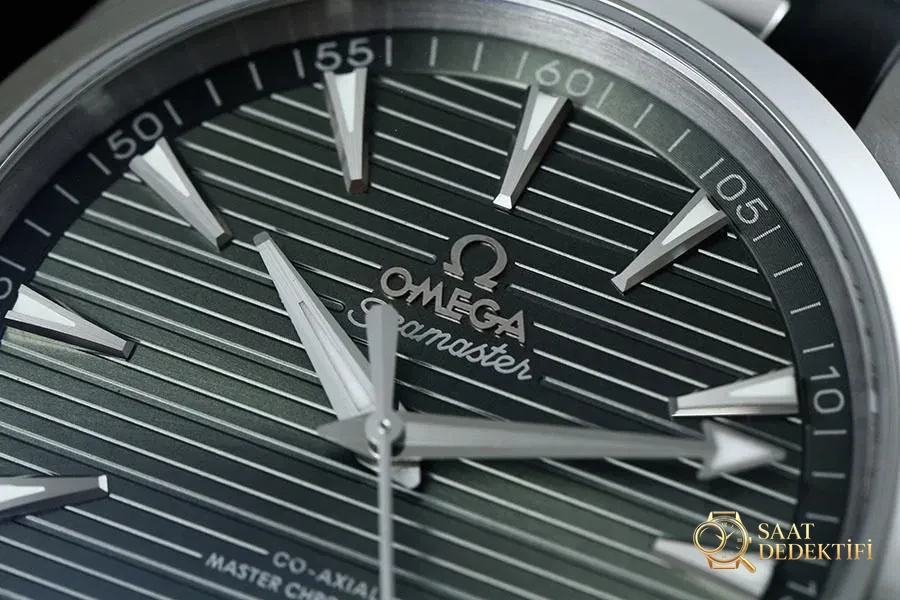 VS Factory Omega Seamaster 150M tik ağacı yeşili kadranlı replika kol saati - VS saat - Kasa Profili ve Kurma Kolu İncelemesi