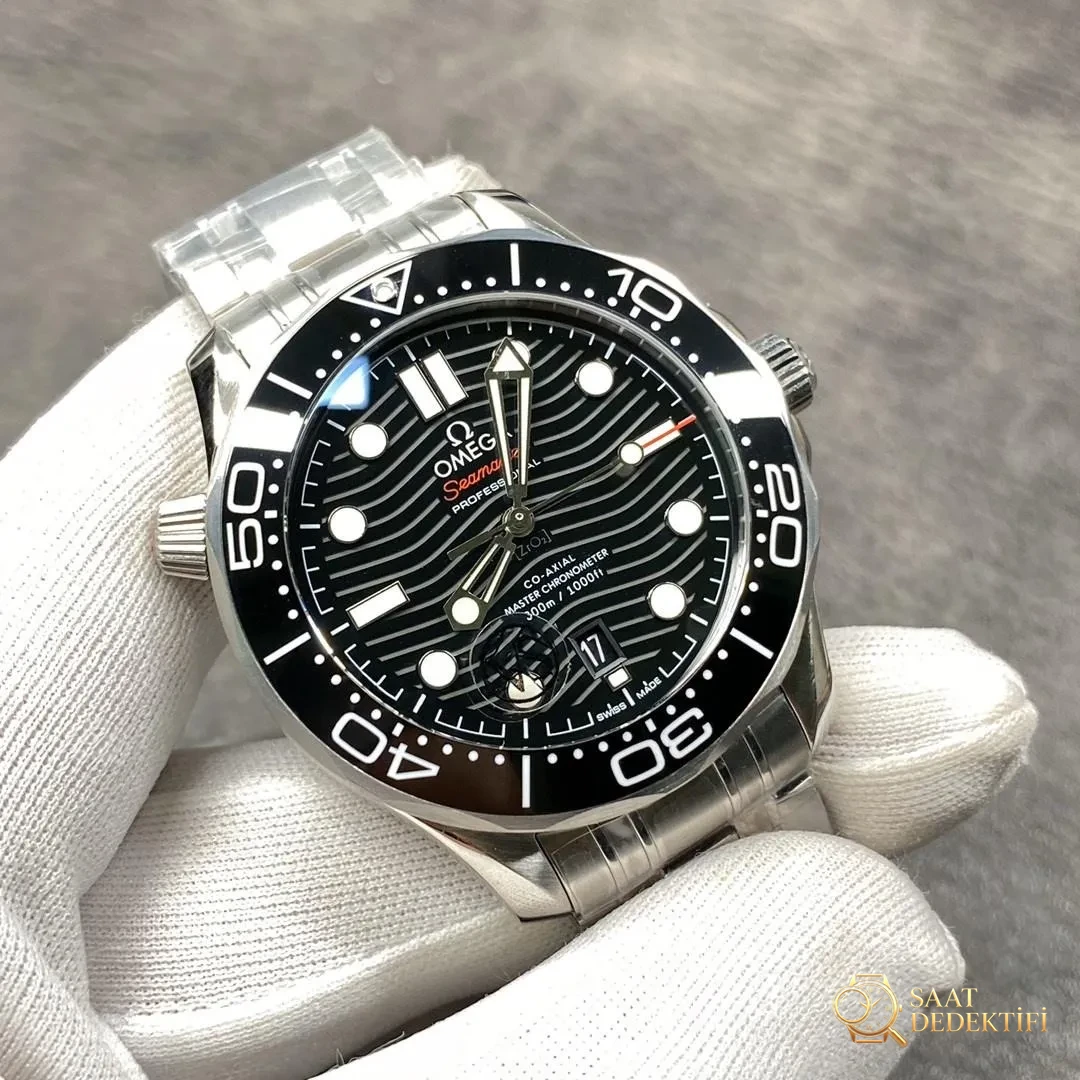 VS Omega Seamaster 300 küçük fabrika ürünlerinden nasıl ayırt edilir? - Kasa Profili ve Kurma Kolu İncelemesi