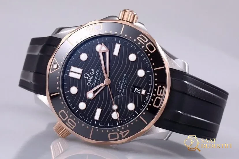 VS Omega yeni Seamaster 300 çift ton rose gold 8800 mekanizmalı replika saat incelemesi - Tepe Koruması ve Ayar Fonksiyonu